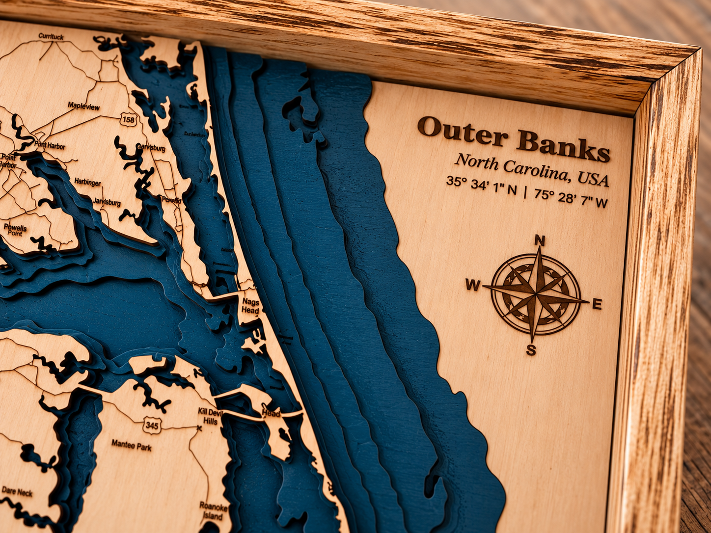 Close-up of the Outer Banks layered coastline, engraving and pine frame